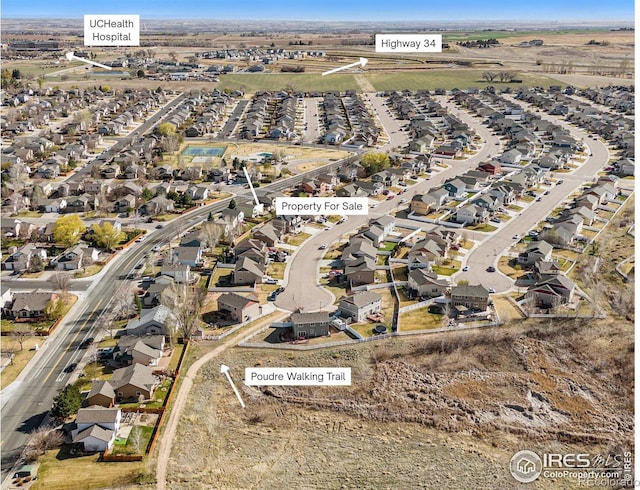 2118 74th Avenue Ct, Greeley, CO 80634 - drone / aerial view with a residential view