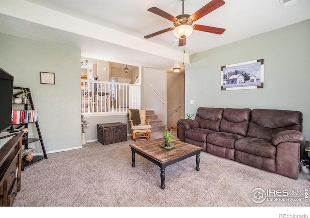 2118 74th Avenue Ct, Greeley, CO 80634 - carpeted living room with baseboards, a ceiling fan, and stairs