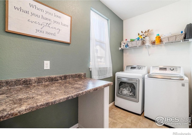 2118 74th Avenue Ct, Greeley, CO 80634 - laundry area featuring separate washer and dryer and laundry area