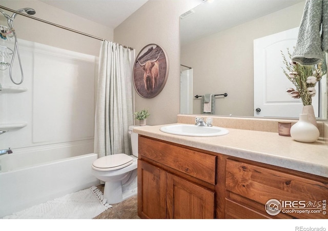 2118 74th Avenue Ct, Greeley, CO 80634 - full bath with shower / bath combination with curtain, vanity, and toilet