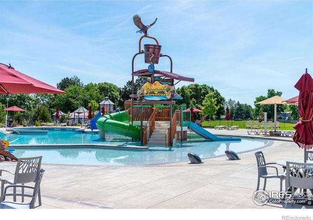 1616 Longbow Ct, Lafayette, CO 80026 - community pool with a water slide, a water play area, and a patio area