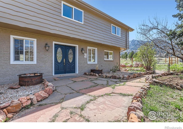 3786 Eldorado Springs Dr, Boulder, CO 80303 - property entrance with fence and a mountain view