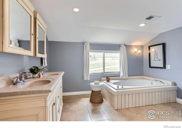 3786 Eldorado Springs Dr, Boulder, CO 80303 - bathroom with visible vents, vaulted ceiling, vanity, baseboards, and tile patterned floors