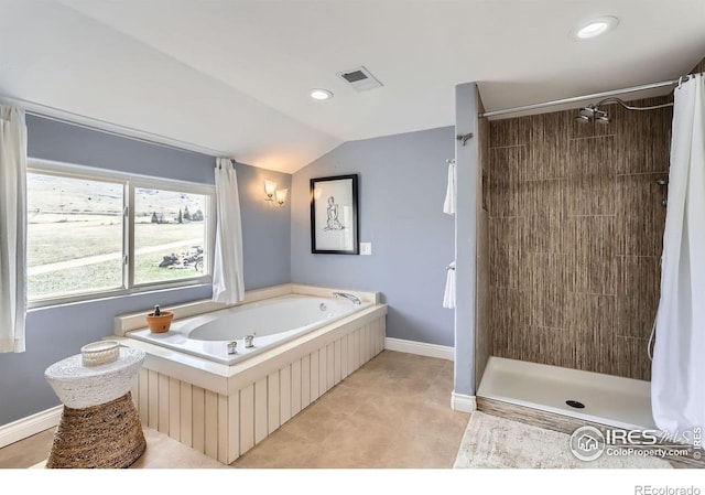 3786 Eldorado Springs Dr, Boulder, CO 80303 - full bathroom featuring visible vents, a garden tub, baseboards, a tile shower, and vaulted ceiling