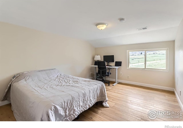 3786 Eldorado Springs Dr, Boulder, CO 80303 - bedroom featuring baseboards, light wood finished floors, and visible vents