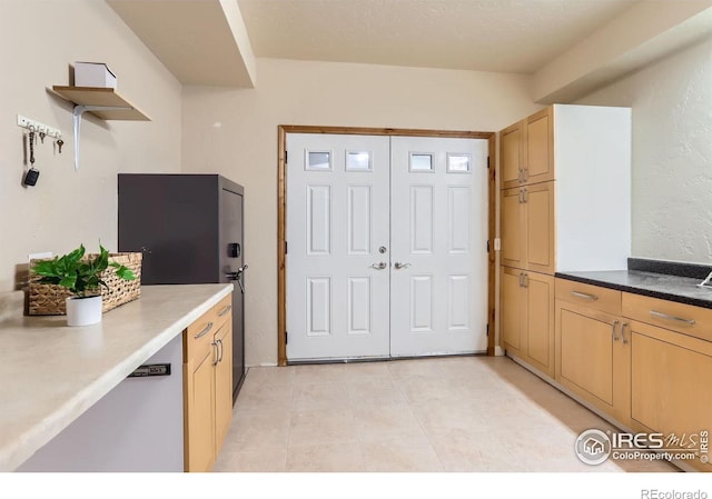 3786 Eldorado Springs Dr, Boulder, CO 80303 - kitchen with open shelves, light tile patterned floors, and light brown cabinetry