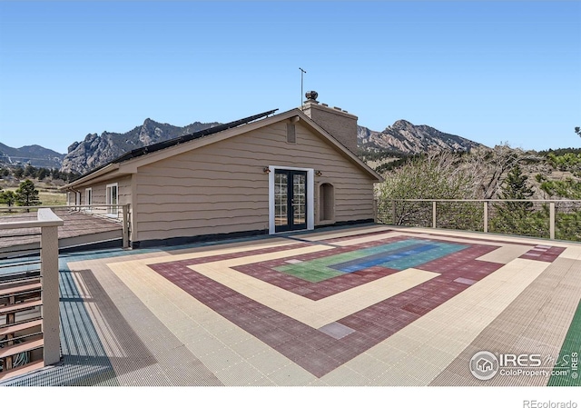 3786 Eldorado Springs Dr, Boulder, CO 80303 - exterior space with french doors and a mountain view