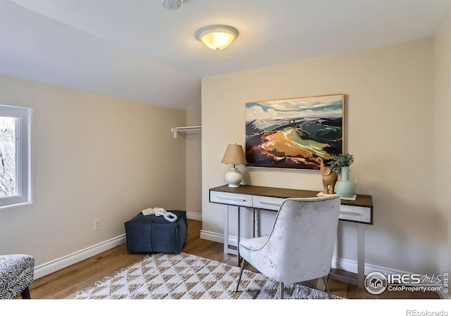 3786 Eldorado Springs Dr, Boulder, CO 80303 - home office with baseboards, vaulted ceiling, and wood finished floors