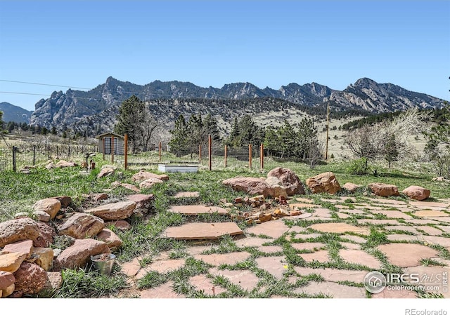3786 Eldorado Springs Dr, Boulder, CO 80303 - view of yard with a garden, a mountain view, and fence