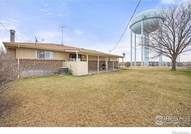 exterior space with a patio, central AC, and fence