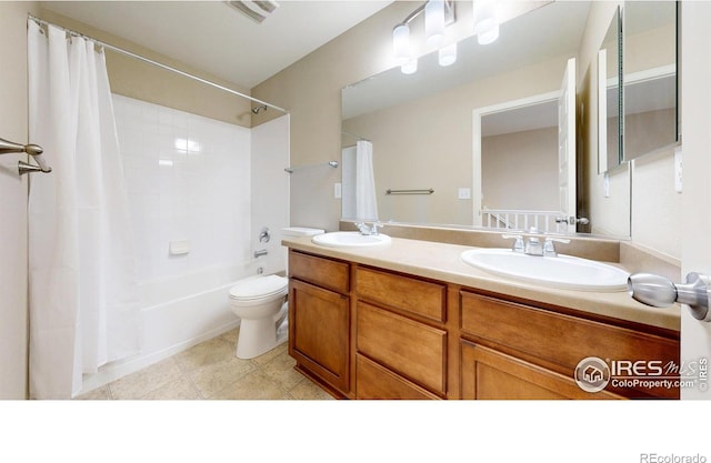 5543 Calgary St, Timnath, CO 80547 - full bathroom featuring toilet, double vanity, and shower / bath combo with shower curtain