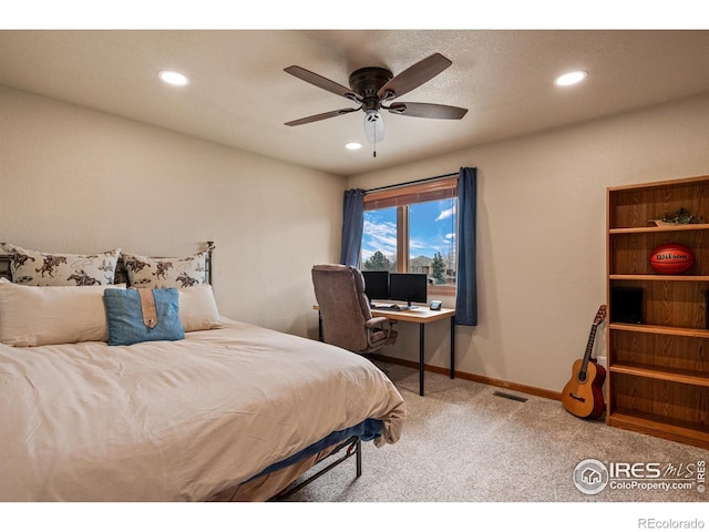 carpeted bedroom featuring baseboards, ceiling fan, recessed lighting, and visible vents