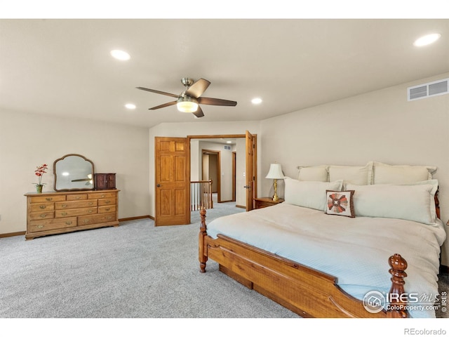 bedroom with recessed lighting, carpet flooring, and baseboards