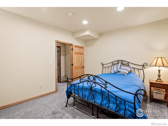 bedroom featuring baseboards, recessed lighting, and carpet