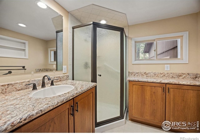 198 Poudre River Rd, Bellvue, CO 80512 - bathroom with vanity, recessed lighting, tile patterned floors, and a shower stall
