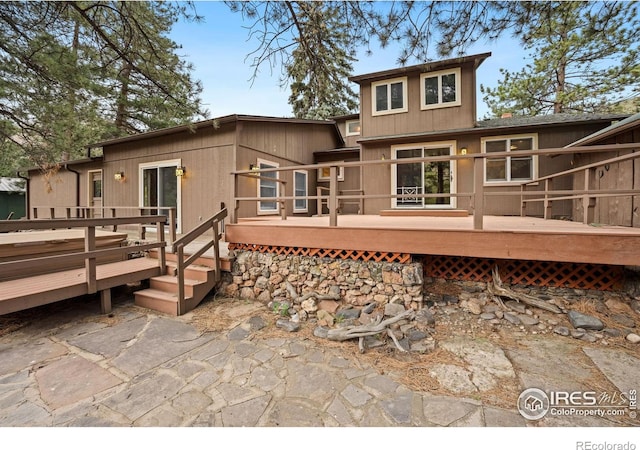 198 Poudre River Rd, Bellvue, CO 80512 - rear view of property featuring a deck