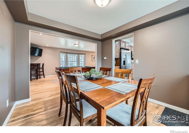 357 W Harper St, Louisville, CO 80027 - dining area featuring light wood-style flooring and baseboards