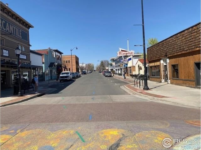 357 W Harper St, Louisville, CO 80027 - view of road featuring a residential view, sidewalks, street lights, and curbs