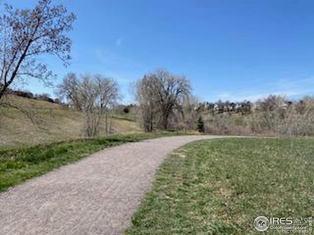 357 W Harper St, Louisville, CO 80027 - view of property's community with a lawn