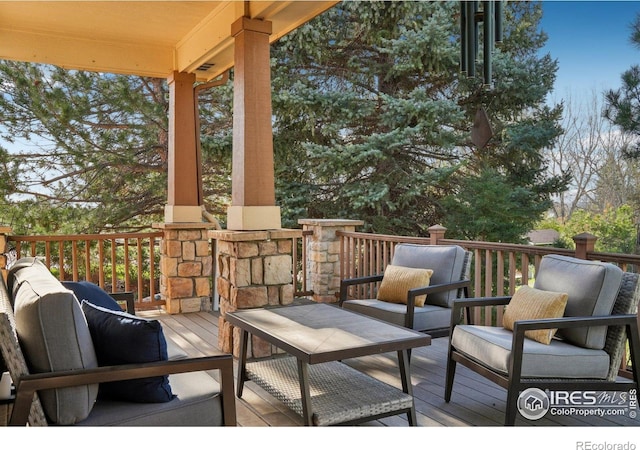deck with outdoor lounge area