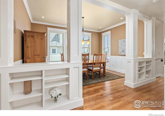 245 Spruce St, Louisville, CO 80027 - interior space featuring light wood-style floors, a decorative wall, ornamental molding, recessed lighting, and a wainscoted wall