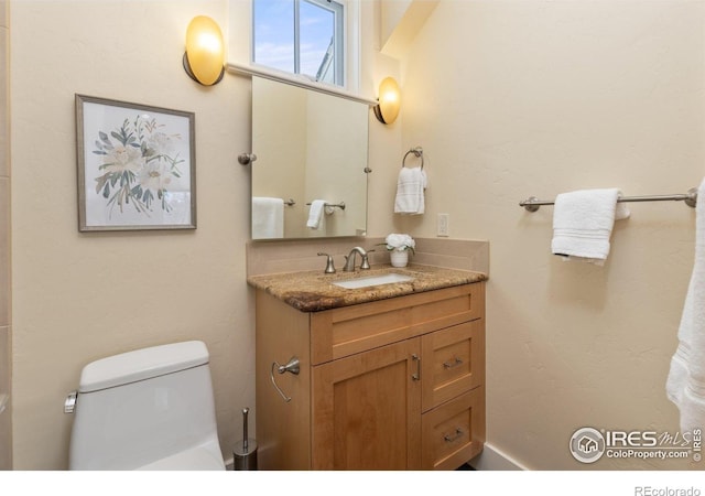 245 Spruce St, Louisville, CO 80027 - bathroom with toilet and vanity