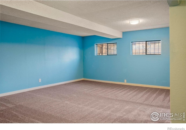 1458 Friendship Ln W, Colorado Springs, CO 80904 - carpeted empty room featuring a textured ceiling and baseboards
