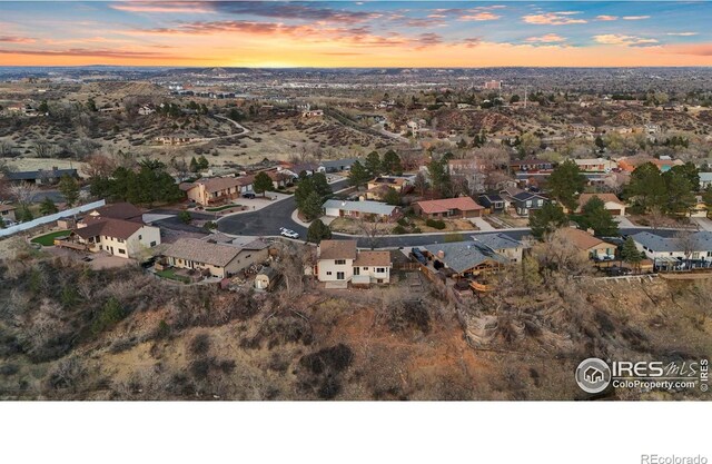 1458 Friendship Ln W, Colorado Springs, CO 80904 - aerial view at dusk featuring a residential view