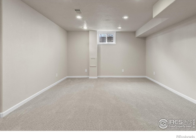 422 38th Ave, Greeley, CO 80634 - basement featuring baseboards, carpet flooring, recessed lighting, and visible vents