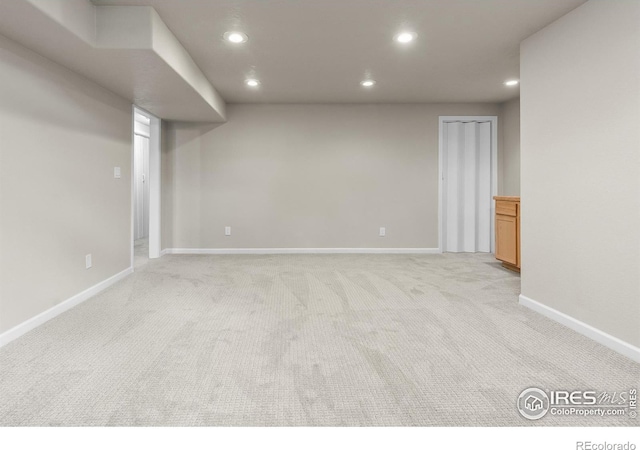 422 38th Ave, Greeley, CO 80634 - finished basement with baseboards, light carpet, and recessed lighting