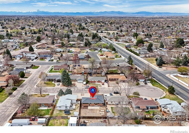 422 38th Ave, Greeley, CO 80634 - birds eye view of property featuring a mountain view and a residential view