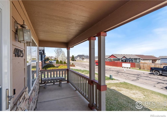 view of patio featuring a residential view and covered porch