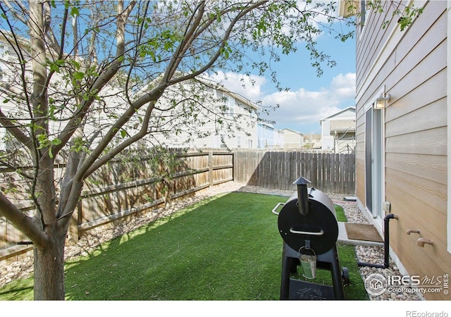 10433 Forester Pl, Longmont, CO 80504 - view of yard featuring a fenced backyard