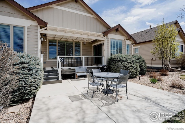 6771 Crooked Stick Dr, Windsor, CO 80550 - view of patio / terrace featuring outdoor dining area