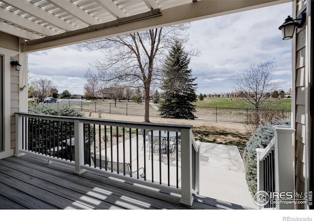 6771 Crooked Stick Dr, Windsor, CO 80550 - deck with a fenced backyard and a pergola