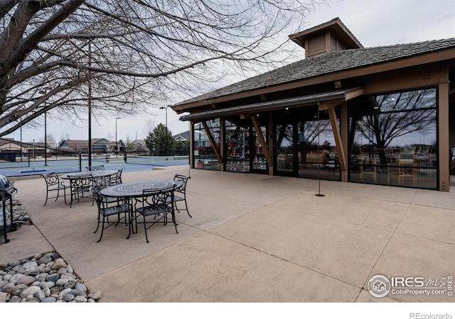 6771 Crooked Stick Dr, Windsor, CO 80550 - view of patio / terrace with a tennis court, a gazebo, and fence