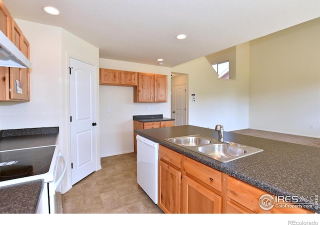 8606 8th St, Greeley, CO 80634 - kitchen featuring recessed lighting, a sink, white appliances, and dark countertops