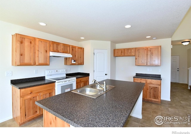 8606 8th St, Greeley, CO 80634 - kitchen with recessed lighting, under cabinet range hood, dark countertops, a sink, and electric stove