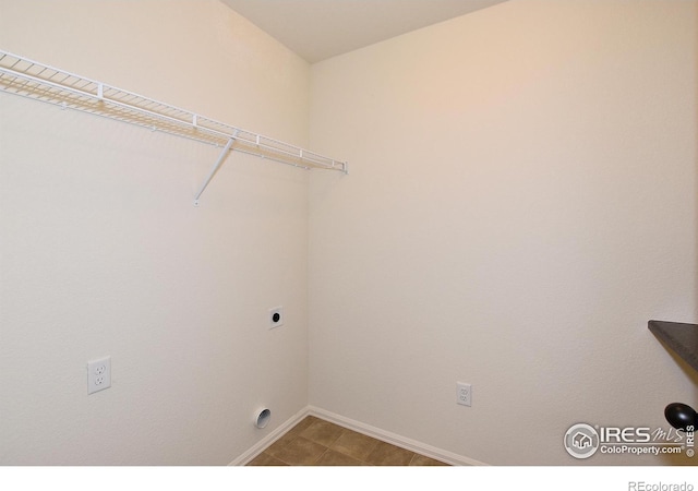 8606 8th St, Greeley, CO 80634 - laundry room with baseboards, electric dryer hookup, and laundry area