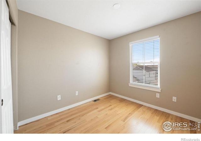 658 Casper Dr, Lafayette, CO 80026 - spare room with baseboards and wood finished floors