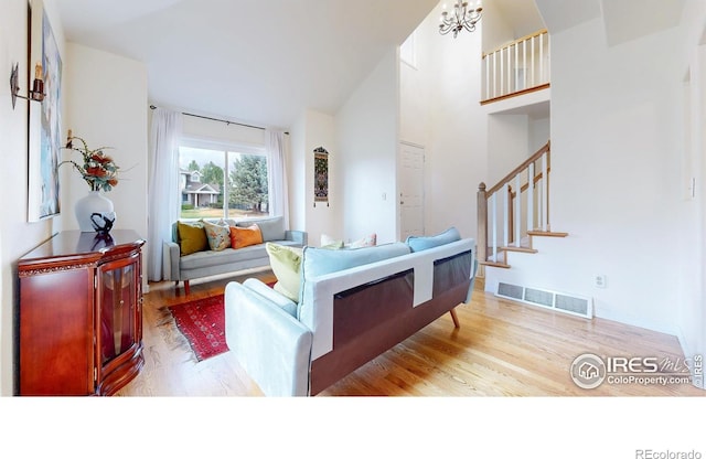 5105 Nelson Ct, Fort Collins, CO 80528 - bedroom featuring visible vents, high vaulted ceiling, and wood finished floors