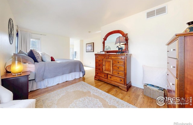 5105 Nelson Ct, Fort Collins, CO 80528 - bedroom featuring wood finished floors and visible vents