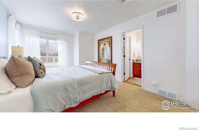 5105 Nelson Ct, Fort Collins, CO 80528 - bedroom with visible vents, baseboards, ensuite bathroom, and light colored carpet