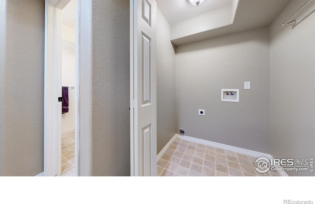 5105 Nelson Ct, Fort Collins, CO 80528 - laundry room featuring hookup for an electric dryer, laundry area, baseboards, and hookup for a washing machine