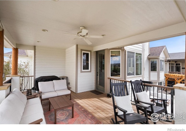 7225 Royal Country Down Dr, Windsor, CO 80550 - deck with an outdoor living space and ceiling fan