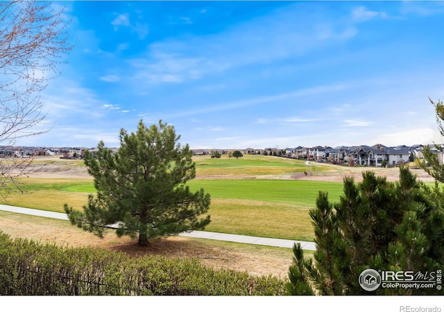 7225 Royal Country Down Dr, Windsor, CO 80550 - view of grassy yard featuring a residential view and golf course view