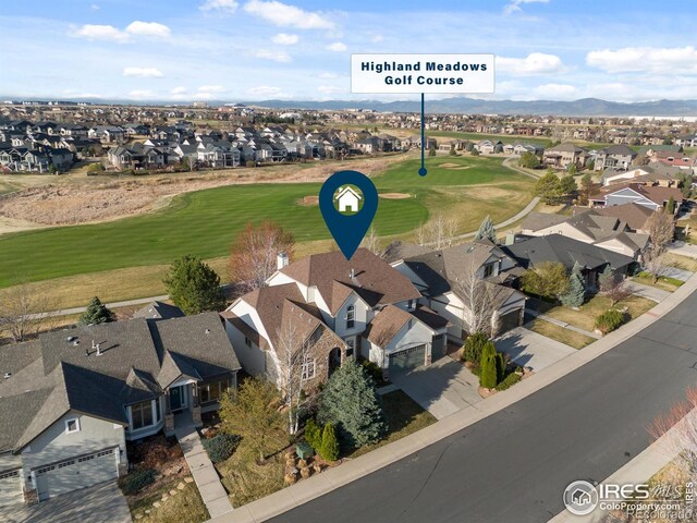 7225 Royal Country Down Dr, Windsor, CO 80550 - view of property location with nearby suburban area, a mountainous background, and a golf course