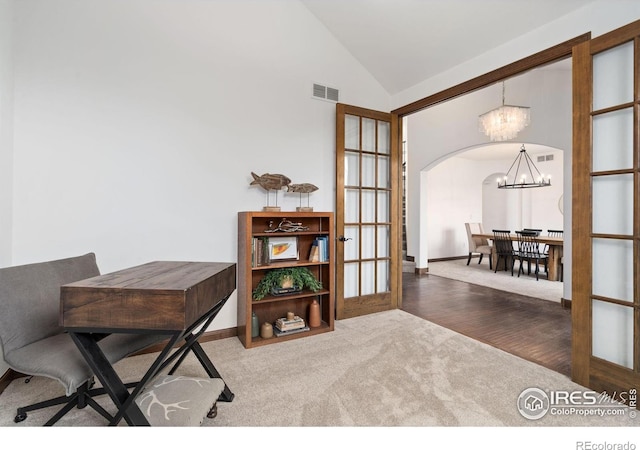 7225 Royal Country Down Dr, Windsor, CO 80550 - office featuring a chandelier, arched walkways, lofted ceiling, french doors, and carpet
