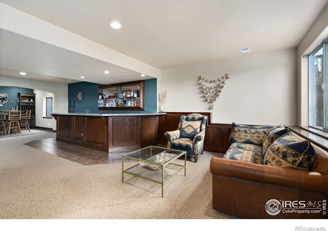 7225 Royal Country Down Dr, Windsor, CO 80550 - welcome area with bar with sink and recessed lighting