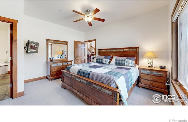 221 Twin Owls Ln Unit F-6, Estes Park, CO 80517 - carpeted bedroom featuring ceiling fan, baseboards, and multiple windows
